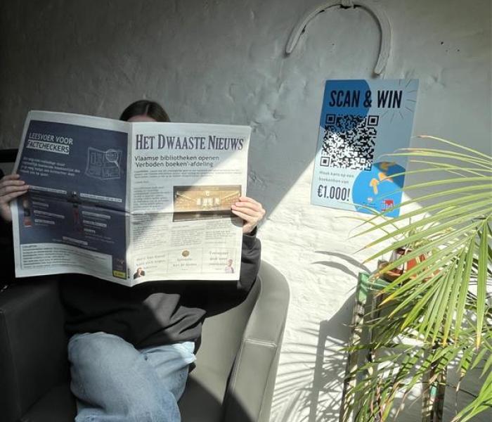 Iemand die een krant leest