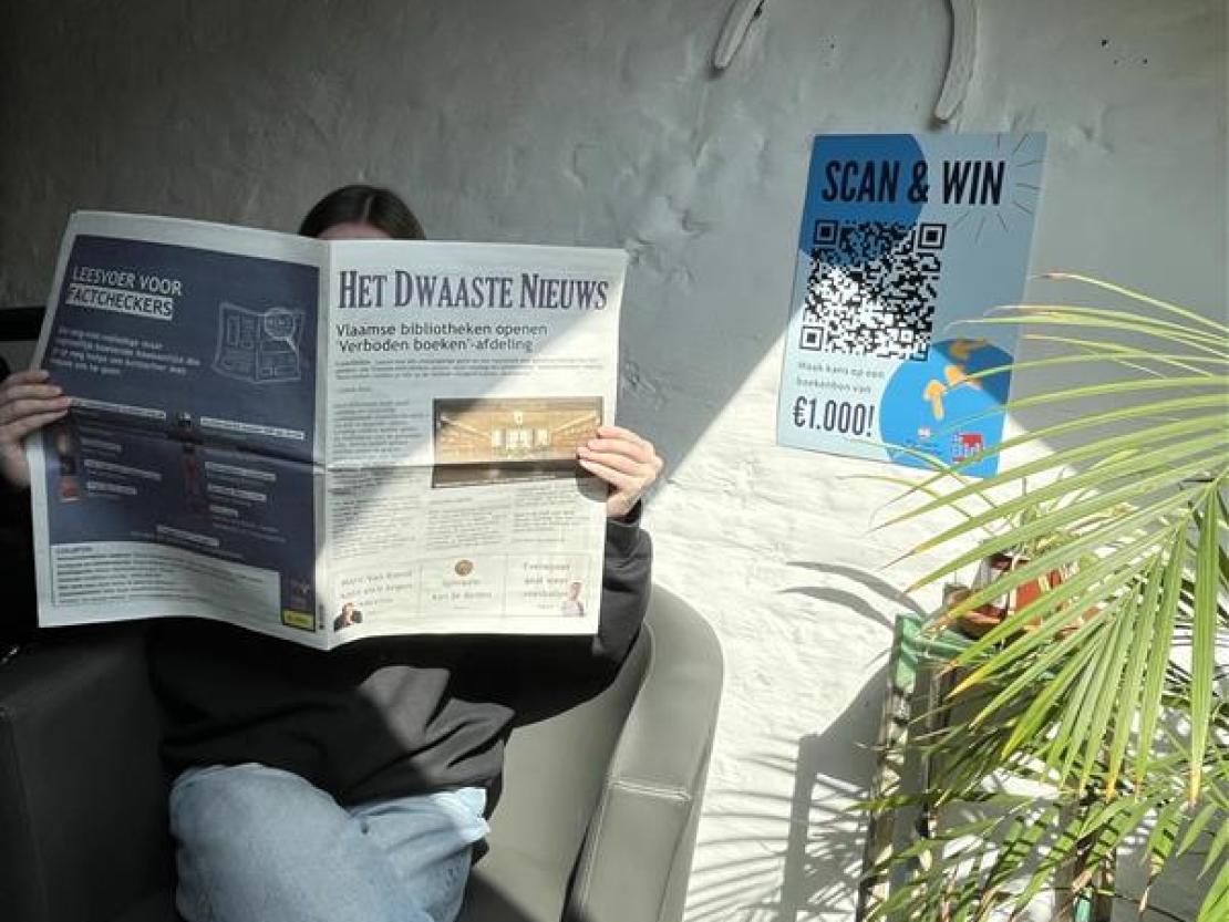 Iemand die een krant leest